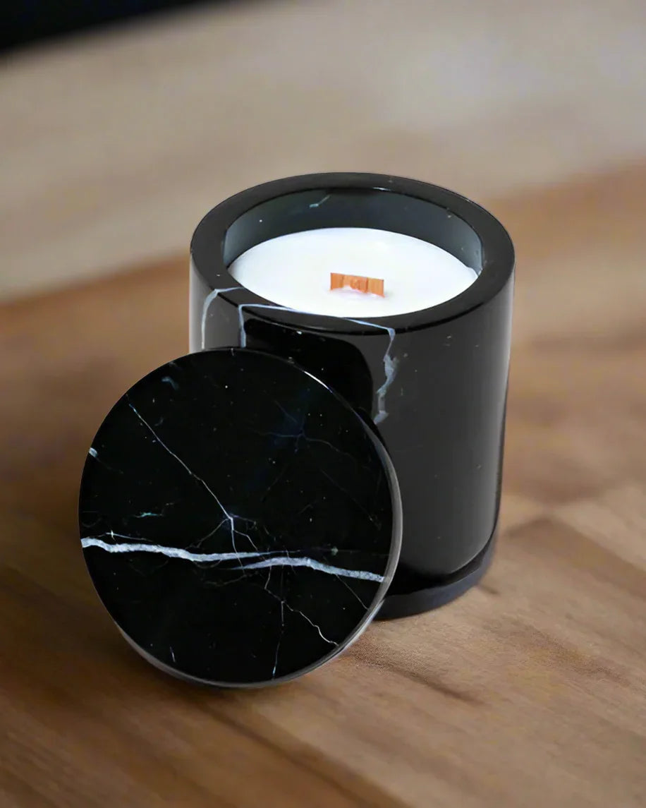Sophisticated black marble candle with white veining, non-toxic, clean burning candle embodies high-end home accessory.