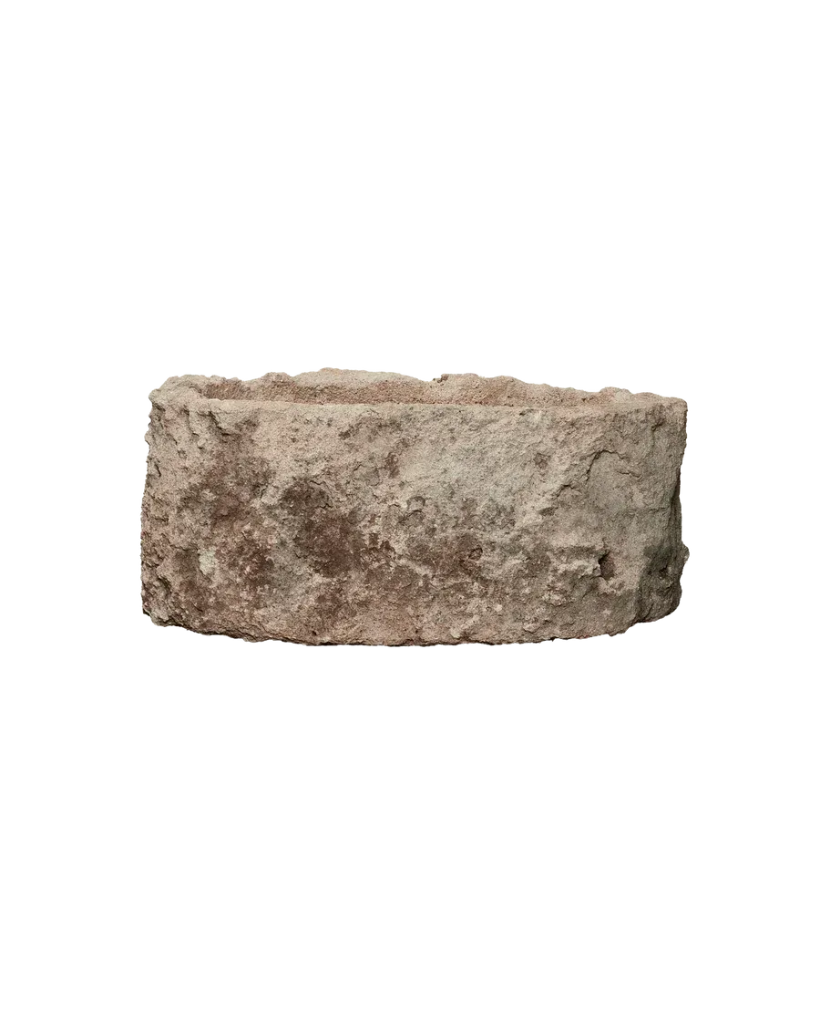 Oblong limestone trough planter with rustic texture for biophilic interior decor