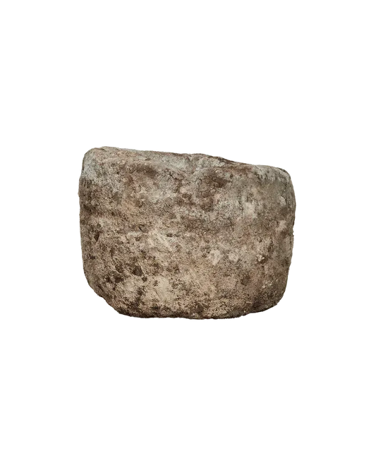 Round limestone trough planter with natural textured surface on black background
