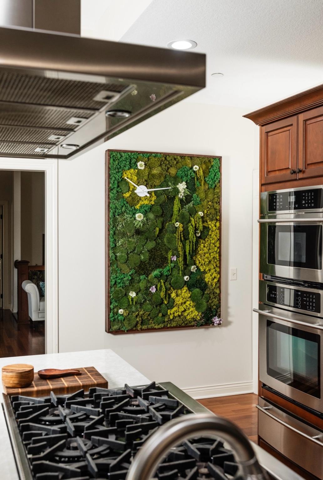 A unique living wall alternative, blending functional timekeeping with a preserved moss installation, designed for modern eco-conscious interiors.
