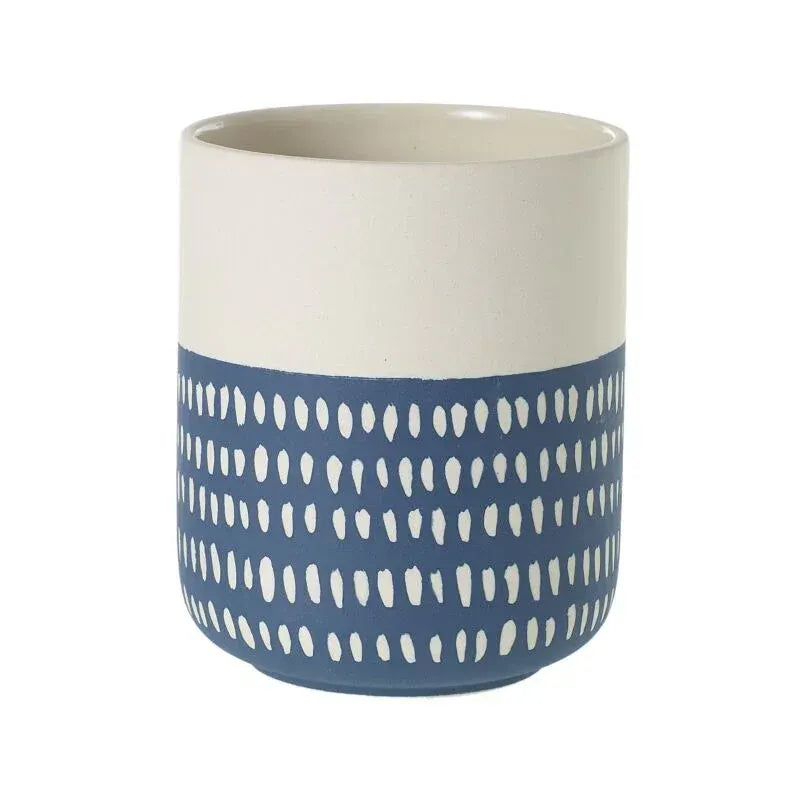 Elegant Westview ceramic planter with a glossy finish and vibrant plants.