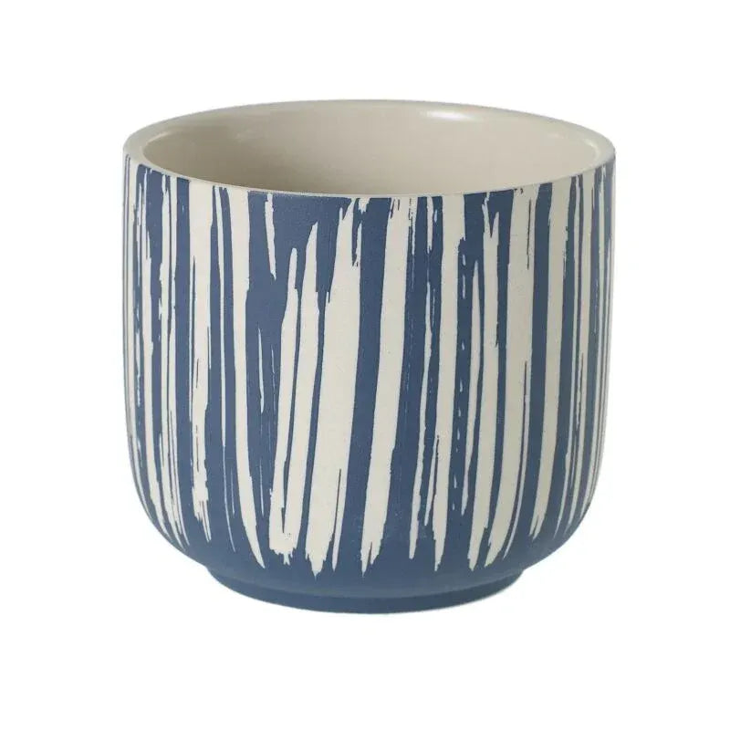 Westview ceramic pot with geometric patterns on a wooden shelf at Trendy Gardener in Des Moines Iowa