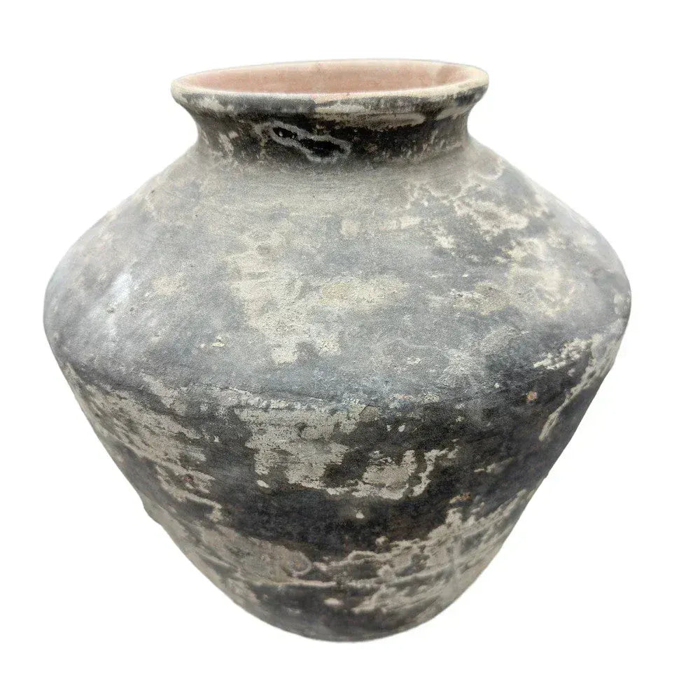 Vietnamese terracotta vessel with a handcrafted rustic finish and rounded form