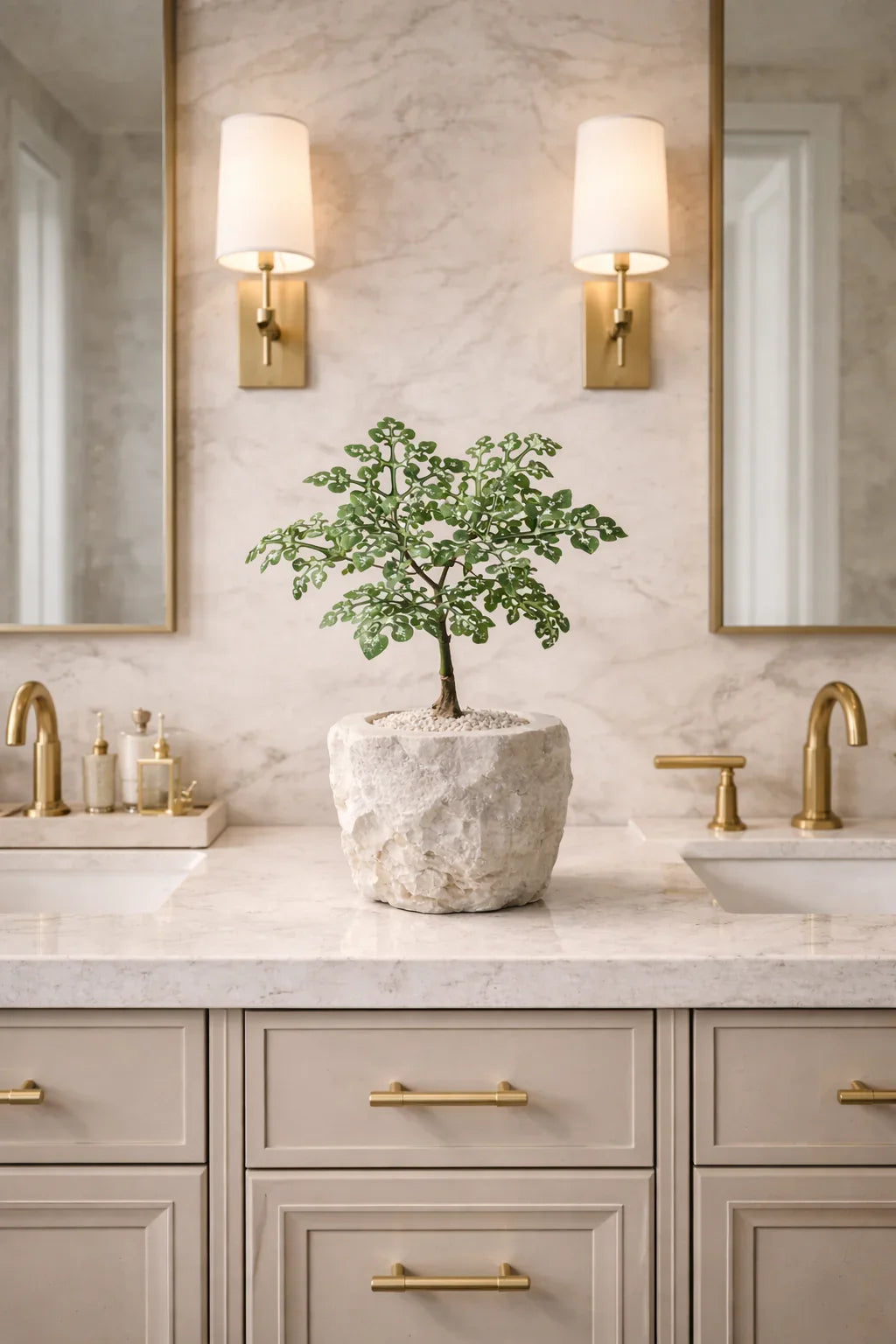 Modern bathroom vanity with indoor plant in a white stone planter on marble countertop
