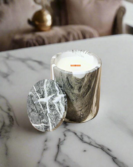 Clean-burning, woodwick candles with elegant fragrance and reusable stone jars in Des Moines, Iowa.