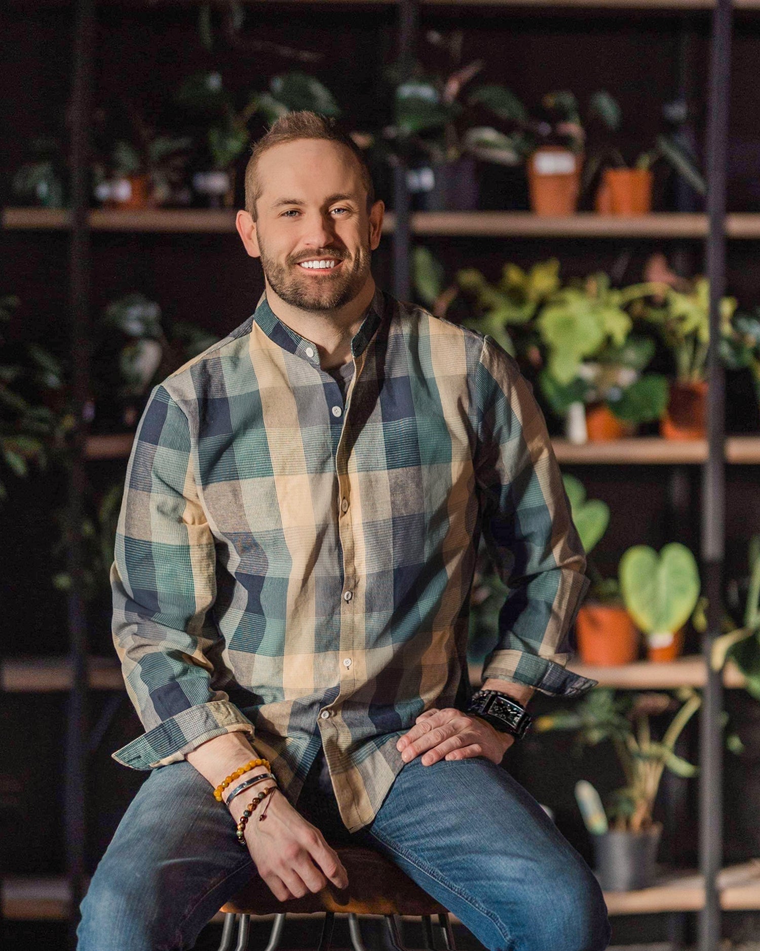 Hunter Frescoln Founder of Trendy Gardener Des Moines, Iowa. Commercial interior plant design, commercial plant maintenance, residential plant design, residential plant care and maintenace, living wall systems, moss wall branding, interior plantscaping, and christmas trees and holiday decor leasing.