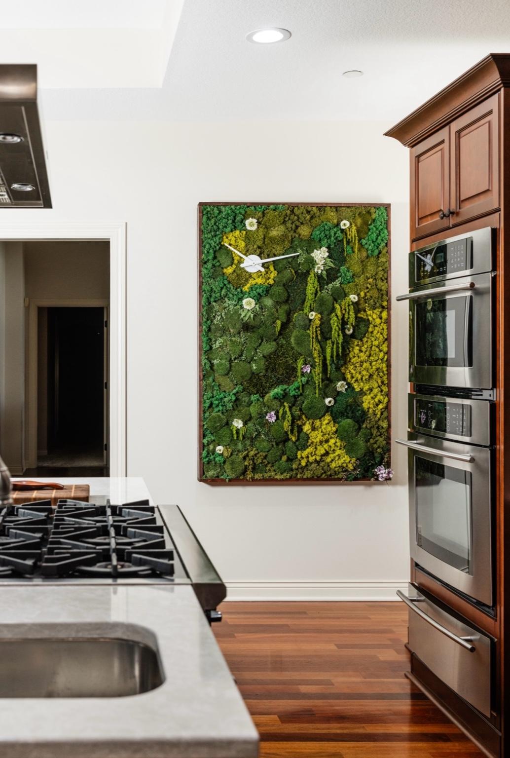 A bespoke moss wall design that brings natural elegance to a high-end home in West Des Moines, crafted for sustainable and elegant interior decor.