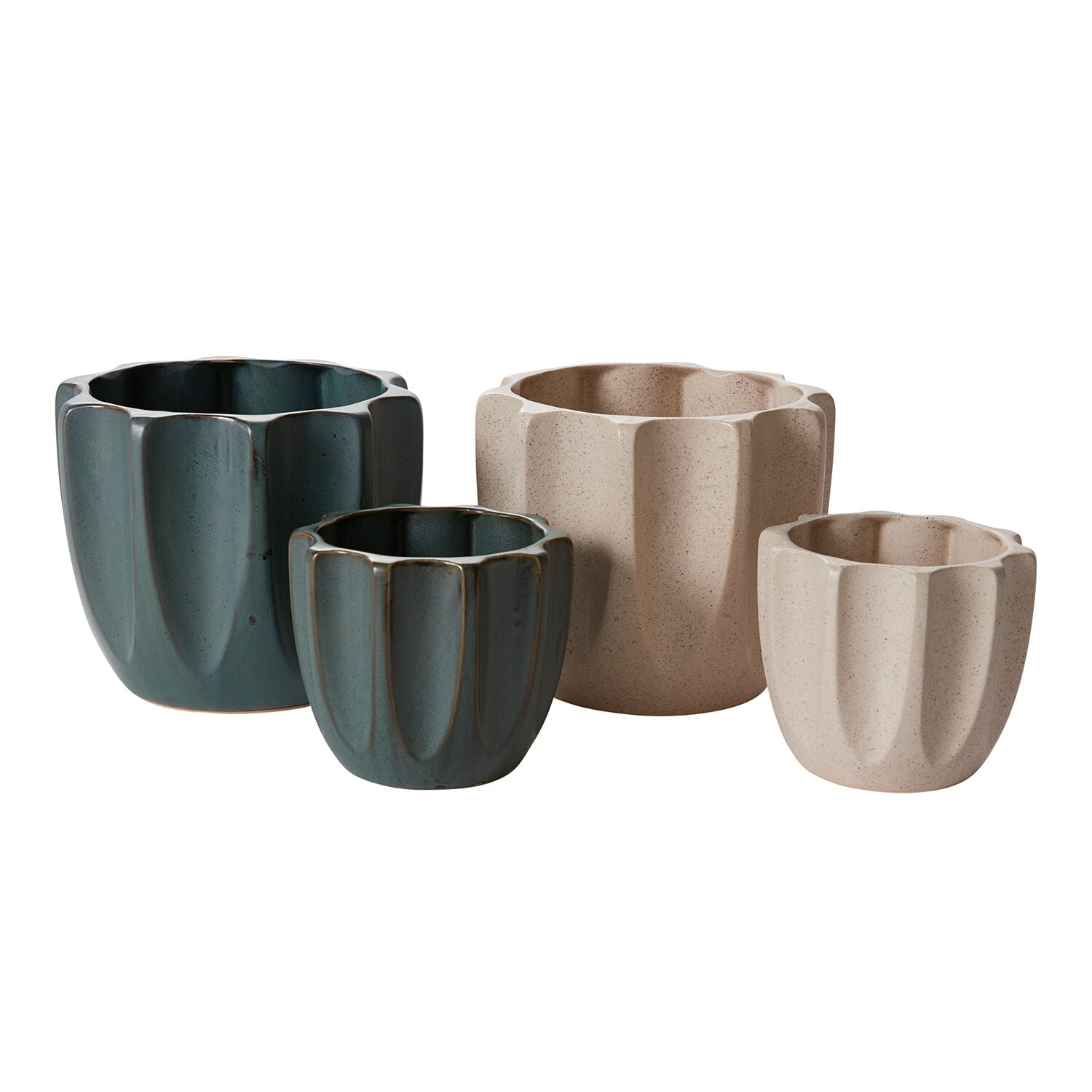 Modern off-white ceramic pots with smooth ribbed detailing and minimalist design.