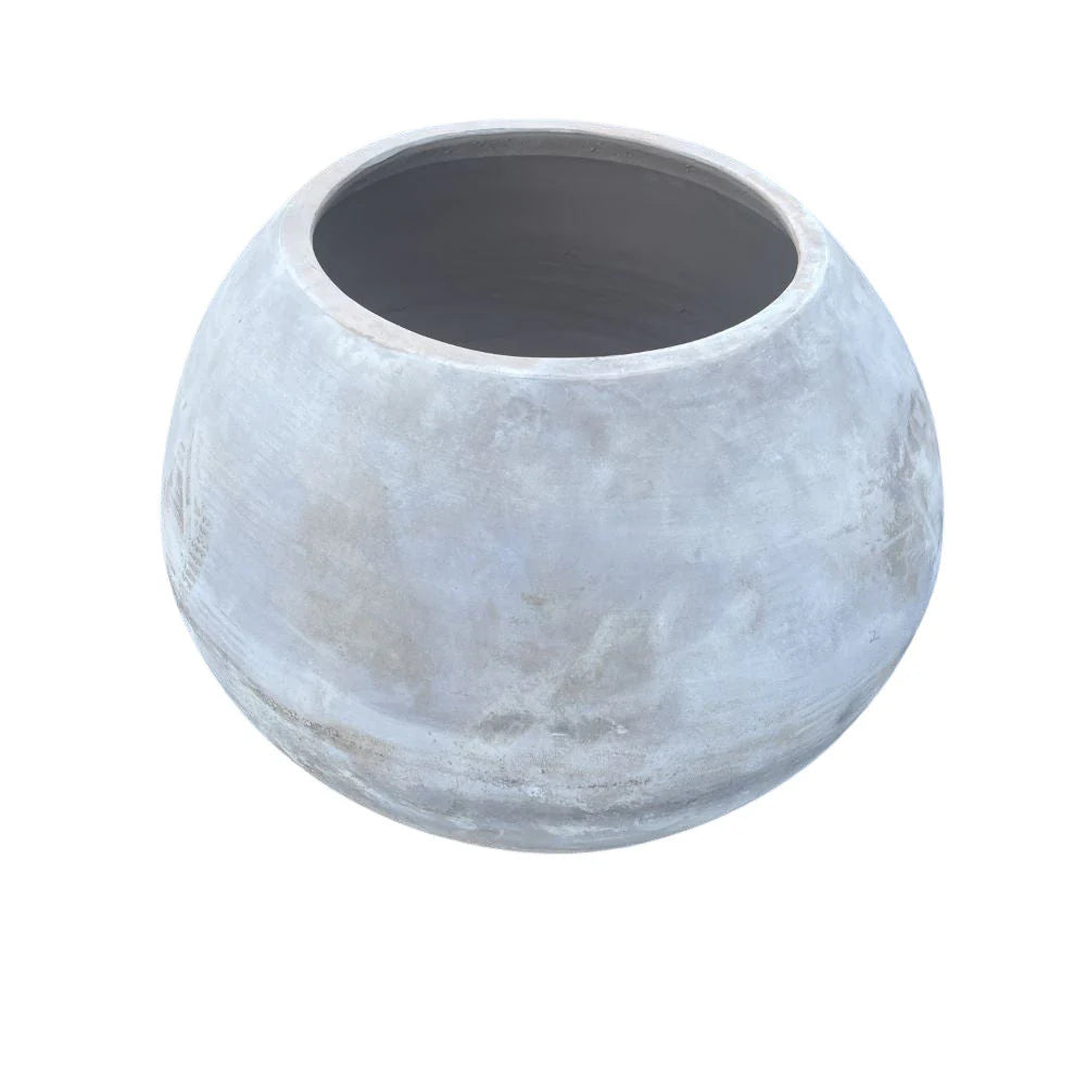 Large round terracotta vessel with natural patina.