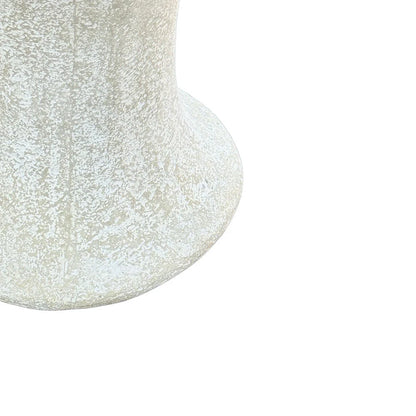 Aged white decorative pedestal vessel with an elongated bowl shape, matte textured finish, and classic sculptural silhouette.