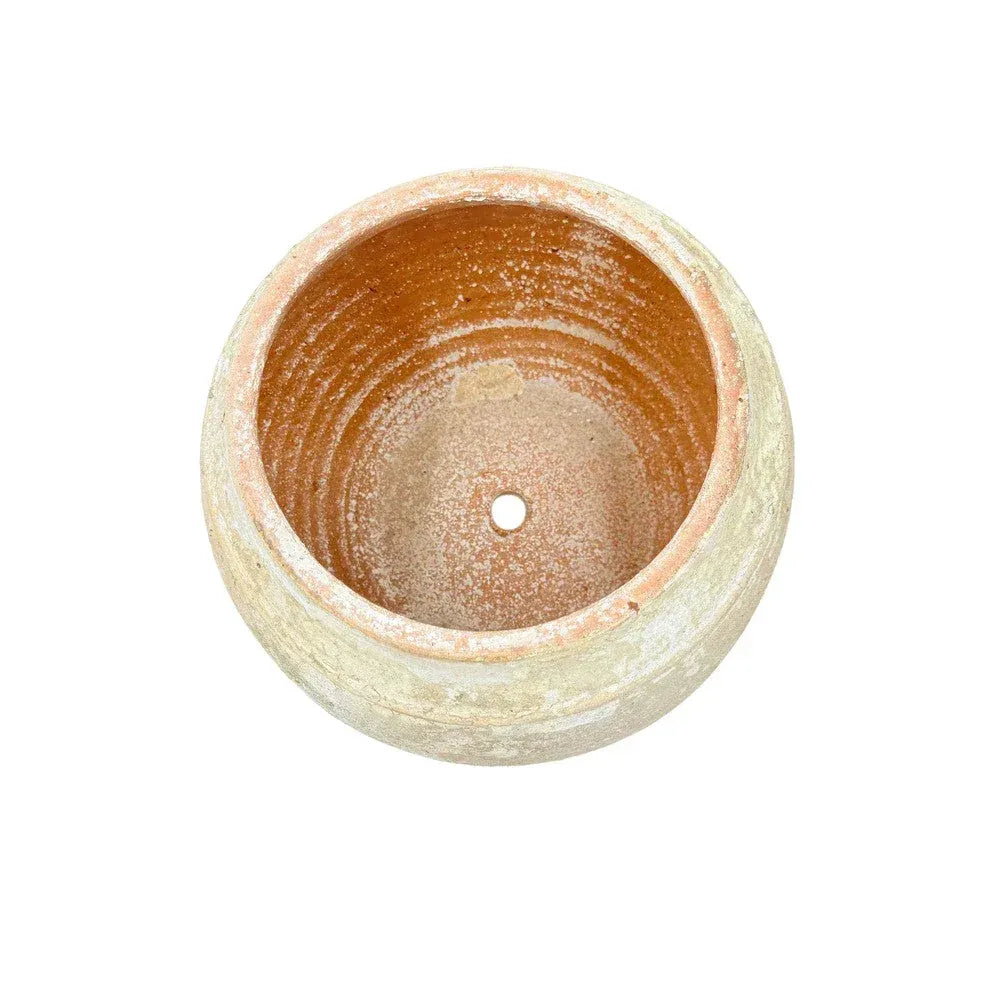 Vietnamese terracotta pot styled as a decorative accent on a console table