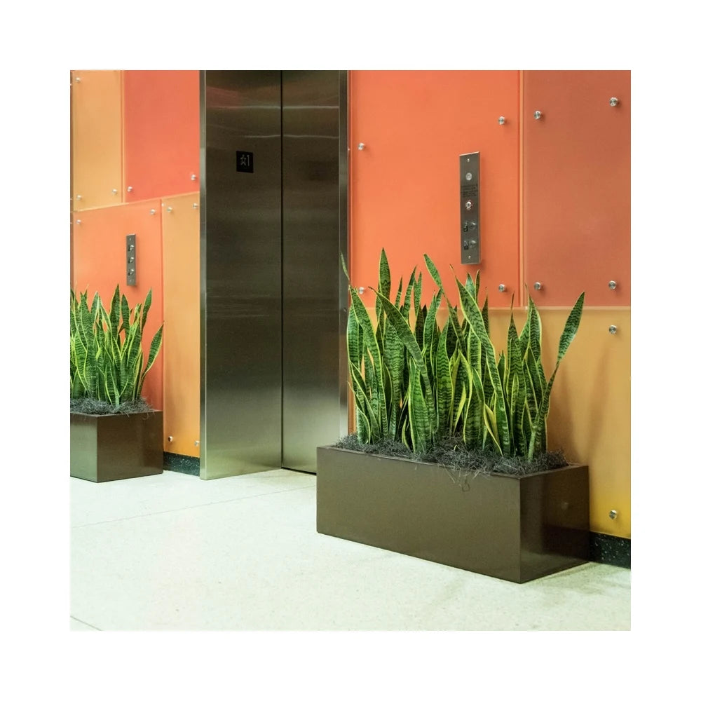 The Kiel rectangle planter with a clean, contemporary design in a durable finish, ideal for enhancing indoor and outdoor spaces with modern plantscaping solutions