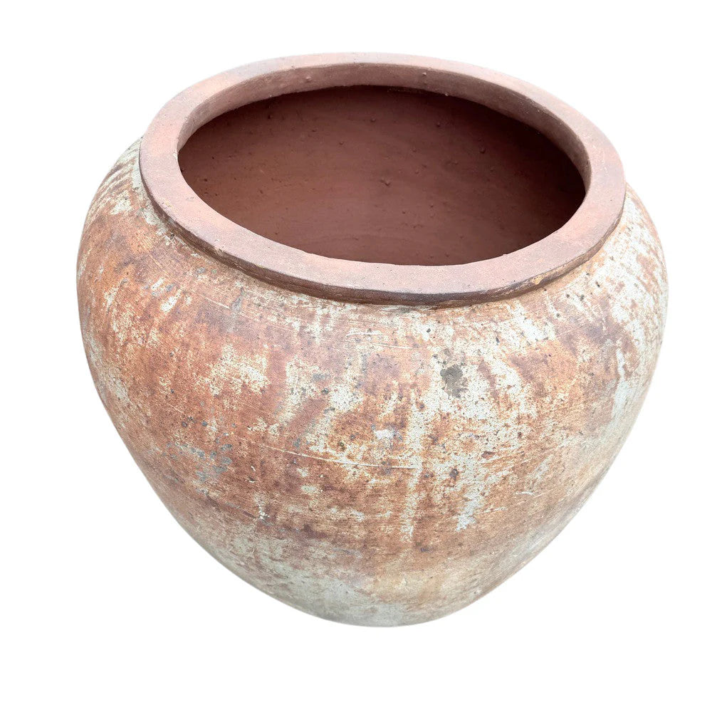 Oversized Vietnamese terracotta planter shown from an angled side view