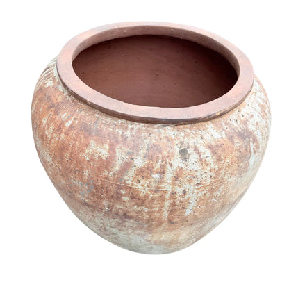 Oversized Vietnamese terracotta planter shown from an angled side view
