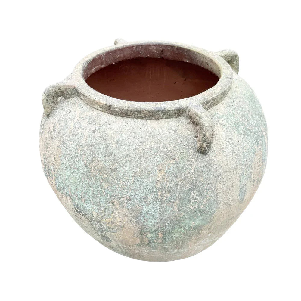 Vietnamese 4-handle terracotta planter styled in an elegant outdoor setting
