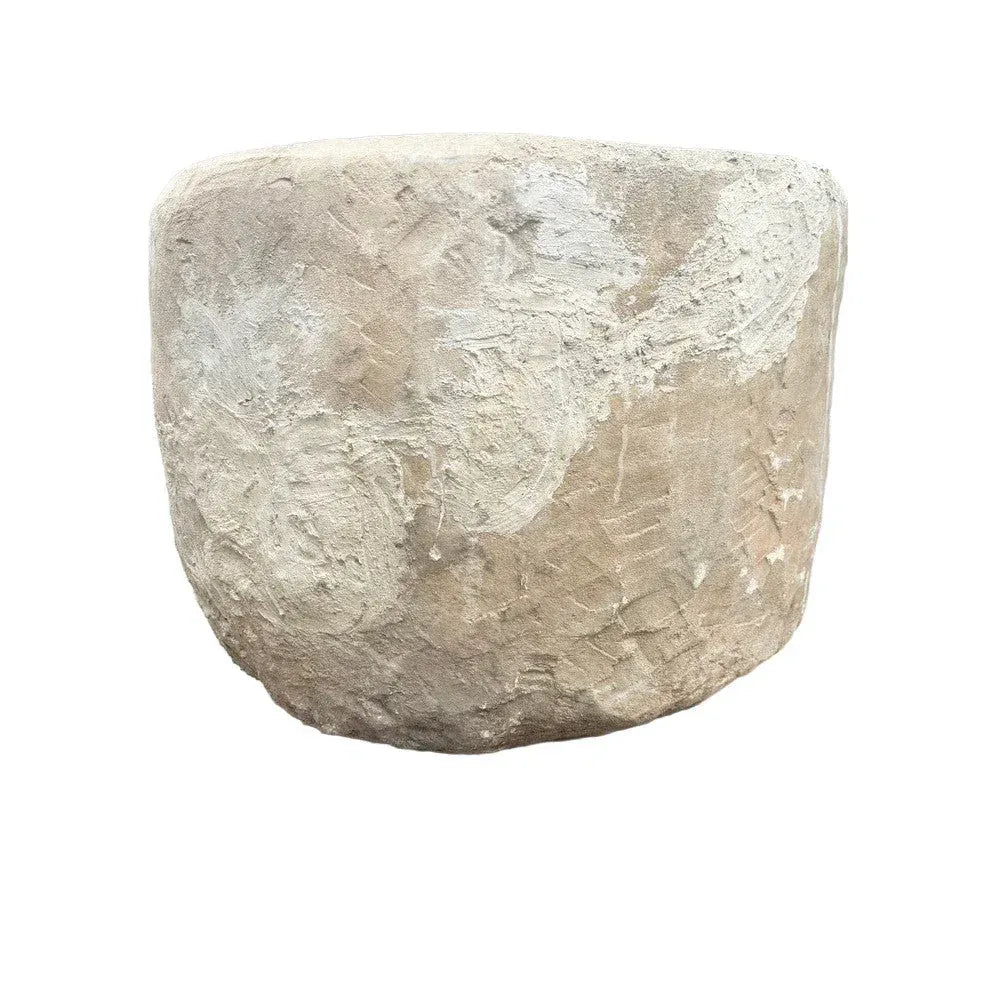 Side profile of Indonesian limestone trough planter, showing natural stone texture and weathered patina, 29.5"W × 24.5"H.