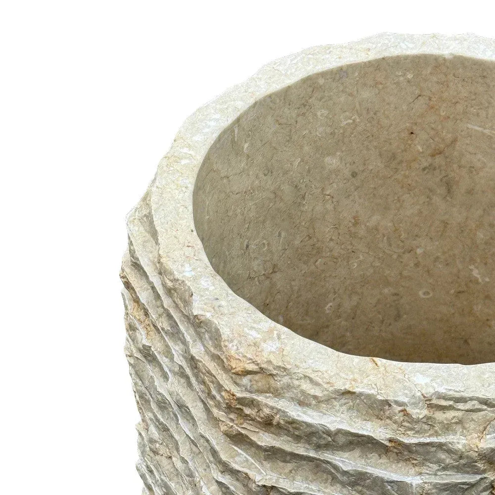 Close-up of the natural veining on a handcrafted marble planter