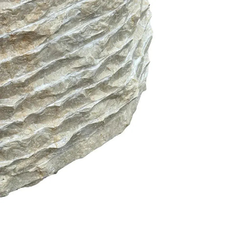 Medium marble planter styled in a refined entryway or patio setting