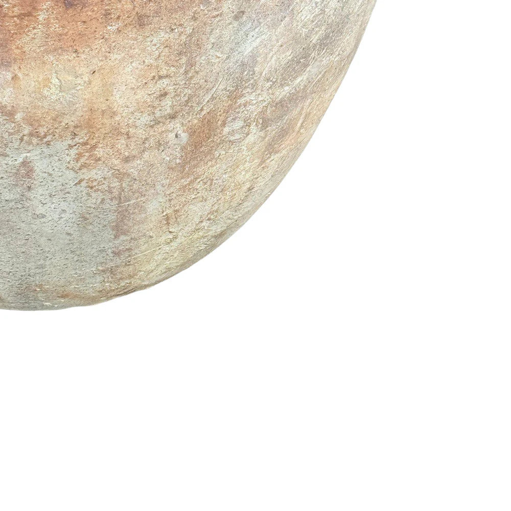 Close-up of the handcrafted texture on a large Vietnamese terracotta planter