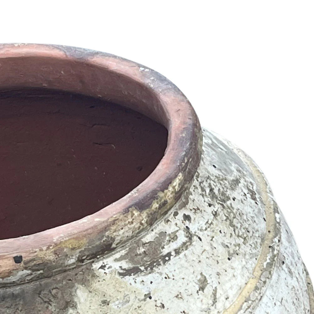 Close-up texture of a handcrafted Vietnamese terracotta planter