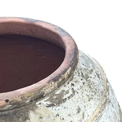 Close-up texture of a handcrafted Vietnamese terracotta planter