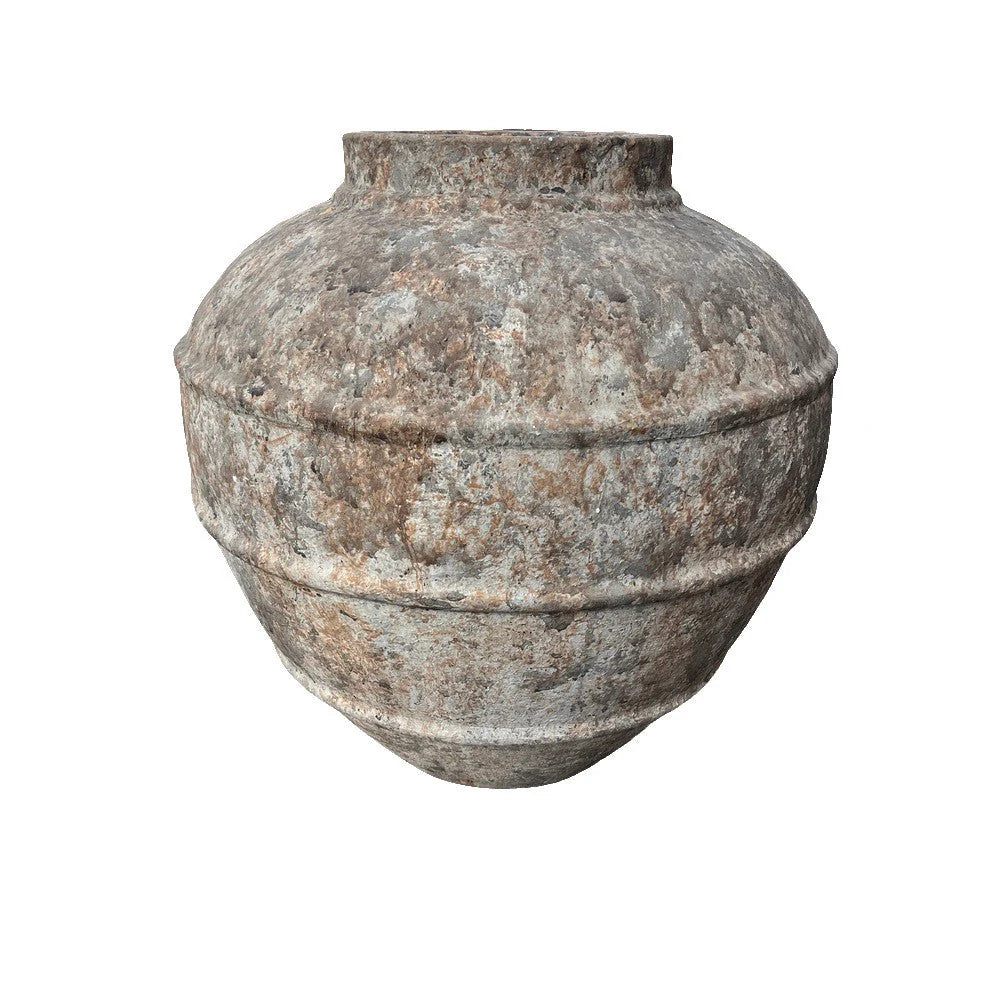Side profile of large round terracotta planter from Indonesia, artisanal clay with earthy texture, 22.5"W × 24.5"H.