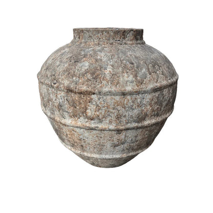 Side profile of large round terracotta planter from Indonesia, artisanal clay with earthy texture, 22.5"W × 24.5"H.