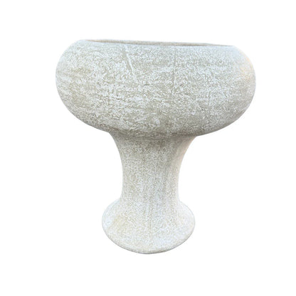 Textured white pedestal bowl planter with a wide rounded top, narrow center stem, and weathered concrete finish.