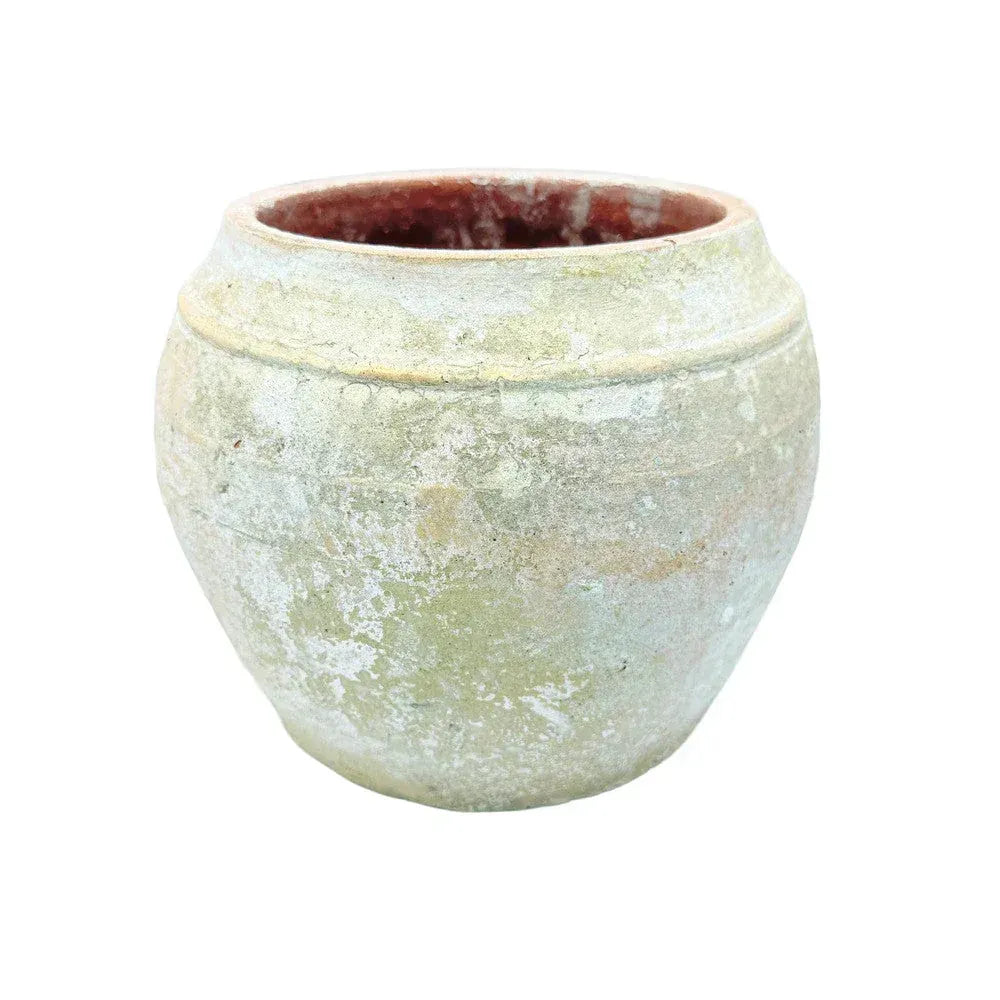 Close-up of the natural texture on a handcrafted terracotta pot