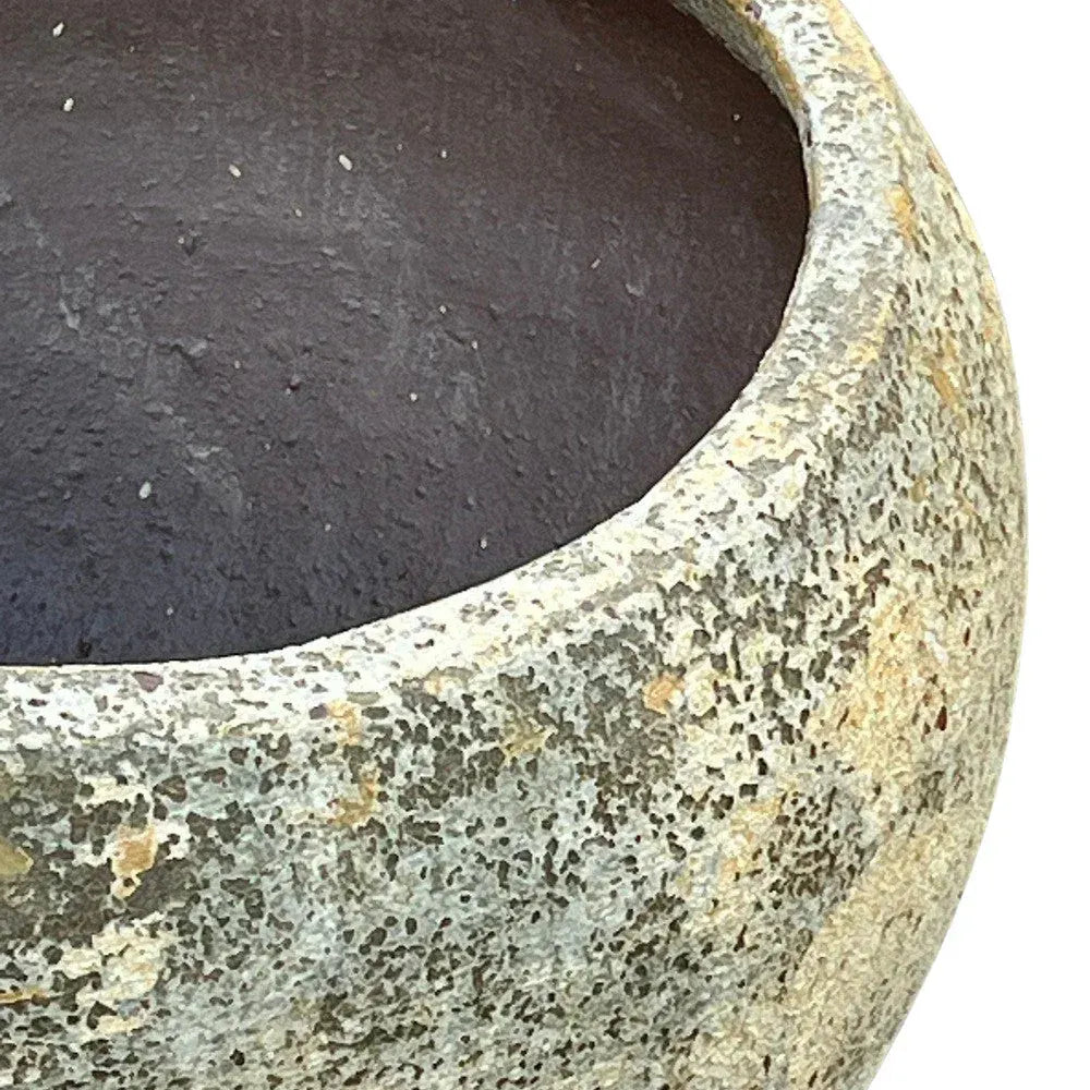 Vietnamese textured terracotta planter collection in Petite, Standard, and Statement sizes